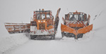 Photographie de d&eacute;neigeuses au travail.